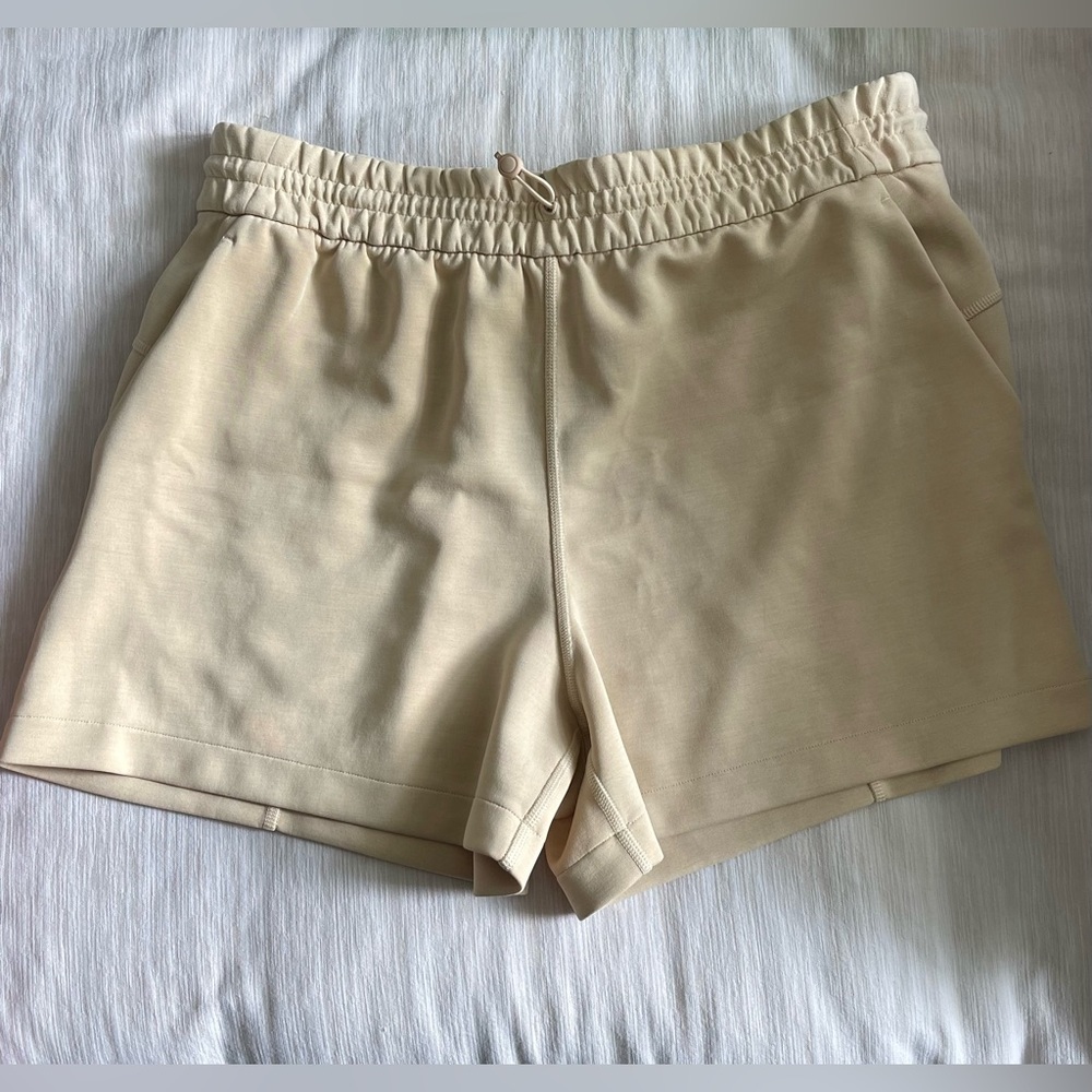Cream lululemon softstreme high-rise short 4”
